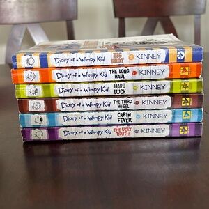 Diary of a Winpy Kid Paper Back - Books 5, 6, 7, 8, 9, and 16 of the series.
